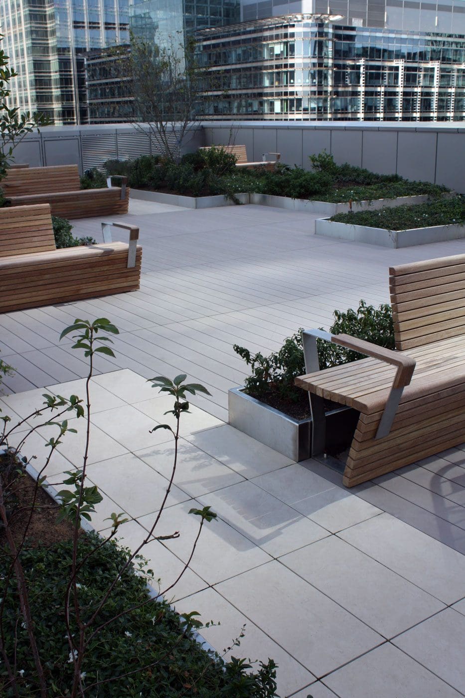 Planters and seating are used to create zones.