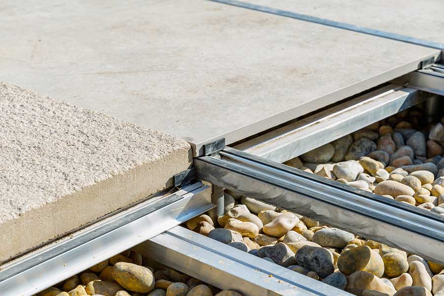 Porcelain and Concrete paving on rail system